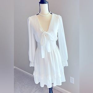 Sophistication and sexy collide in this Zesica Dress